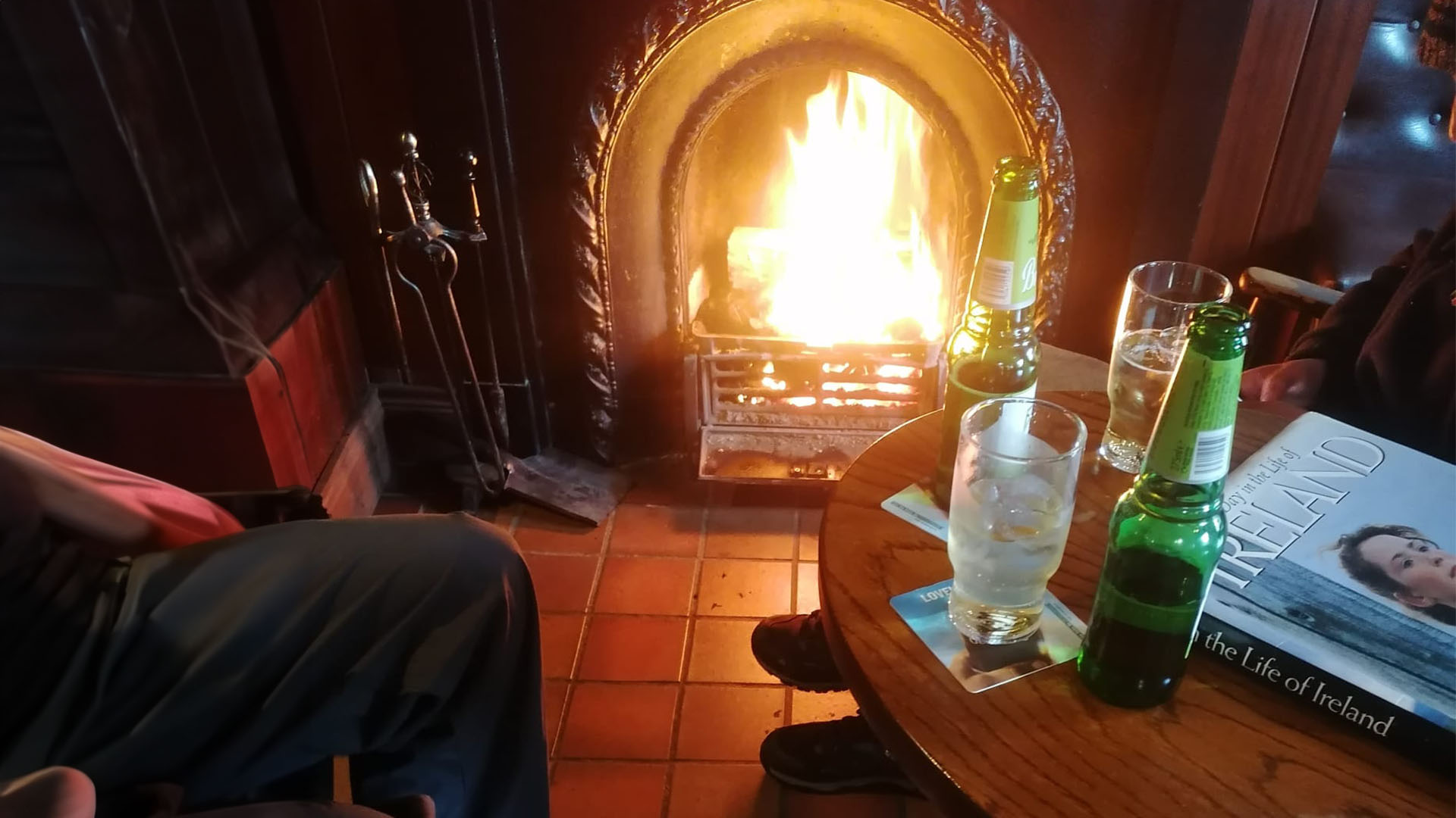 drinking and enjoying fireplace at the shepherds rest after hike